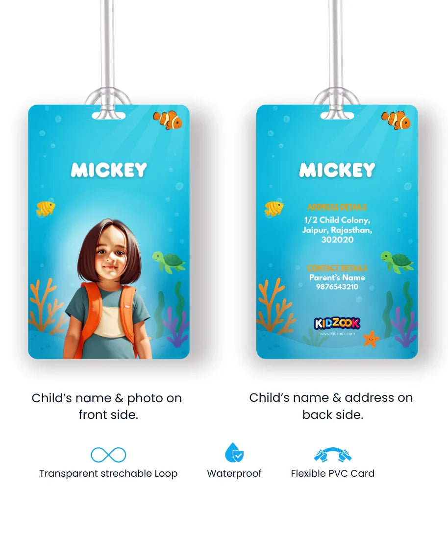 Blue personalised school bag tag showing child’s name and cartoon photo with ocean theme design