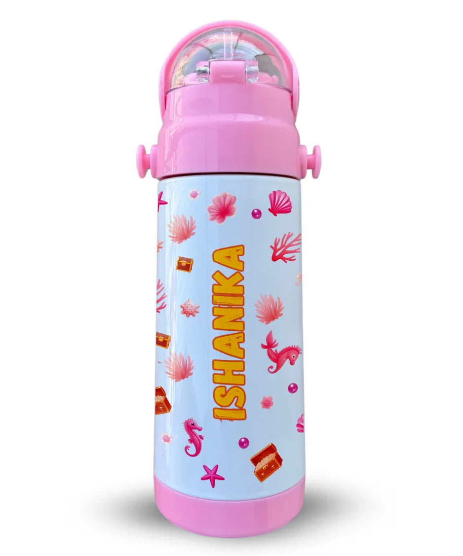 Personalised pink insulated water bottle for kids with name Ishanika, mermaid theme design with sea elements