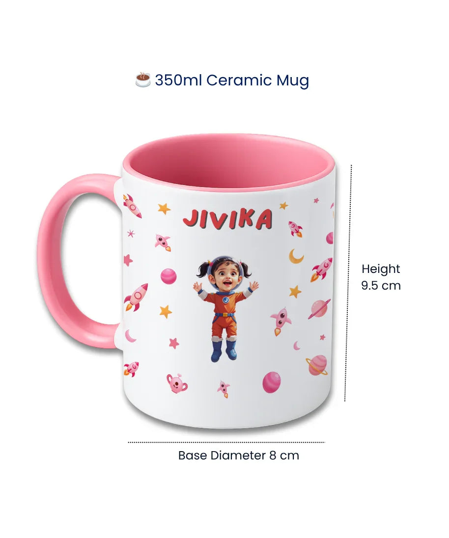 350ml personalised ceramic kids mug with pink handle, astronaut cartoon theme, child name Jivika and photo print – height 9.5cm, base 8cm